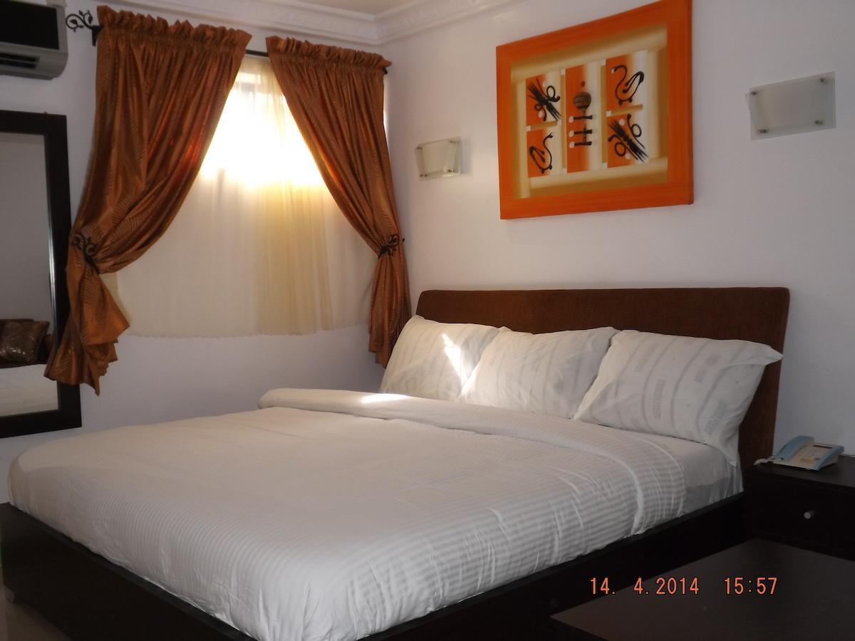 Ben Auto Hotel Lagos Habitación foto
